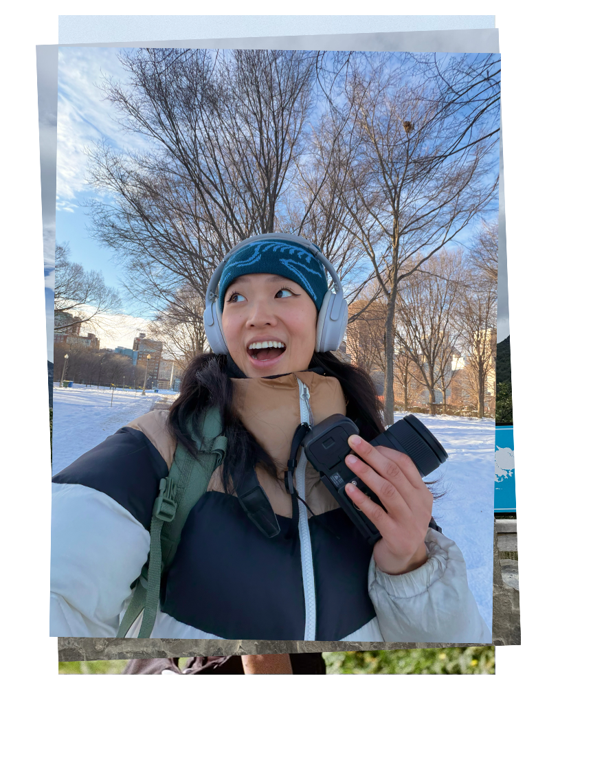 Catherine in the snow with binoculars