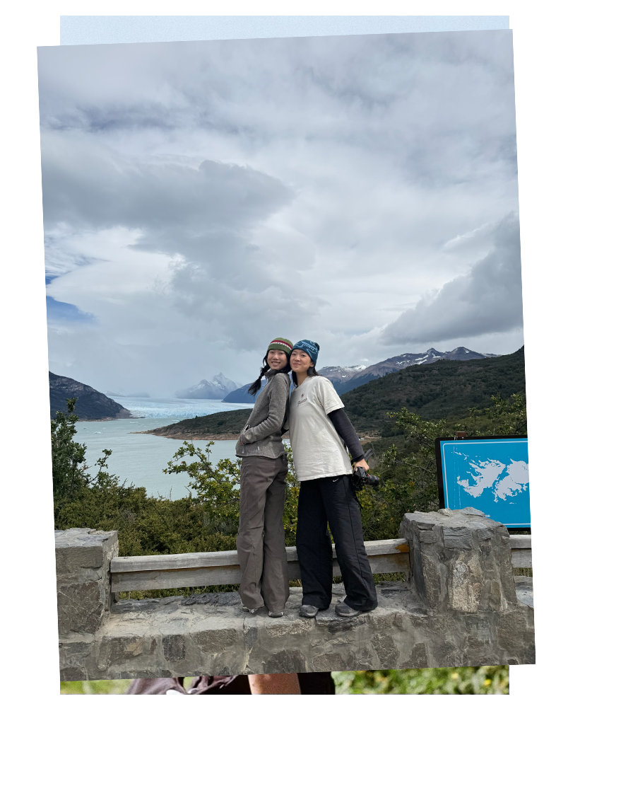 Catherine and a friend in front of a glacier